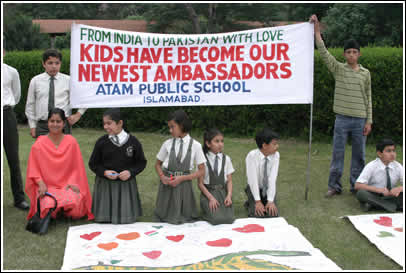 A school-made sign says "Kids have become our newest Ambassadors." We couldn't have said it better ourselves! 