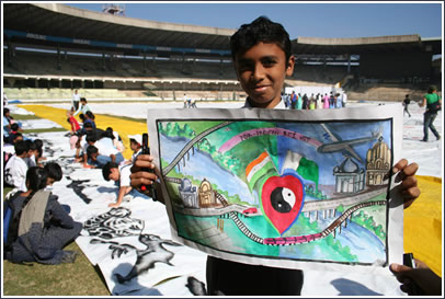 Boy shows off his beautiful illustration.